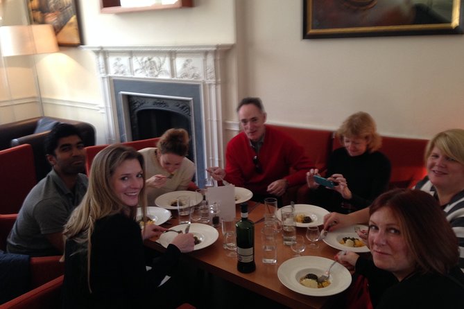 Edinburgh Food & Drink Tour with EatWalk Tours - Starting at St Giles’ Street and entering the Grassmarket