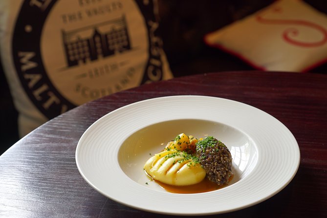 Edinburgh Food & Drink Tour with EatWalk Tours - Old Town food, narrow streets, and a busy central route