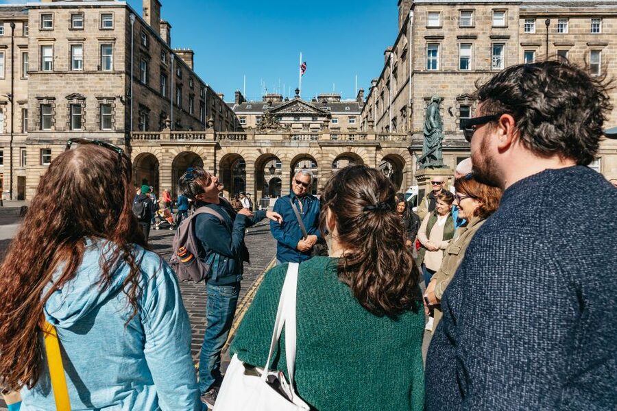 Edinburgh: Old Town History and Tales Walking Tour - Mercat Cross and the public life of old Edinburgh