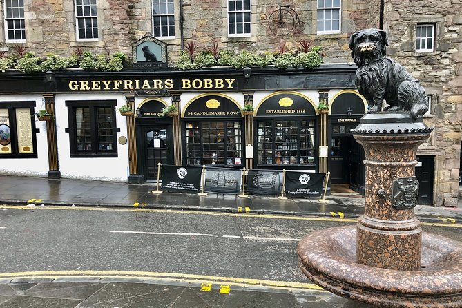 Essential Walking Tour of Edinburgh's Old Town - Mercat Cross reveals the public side of Edinburgh
