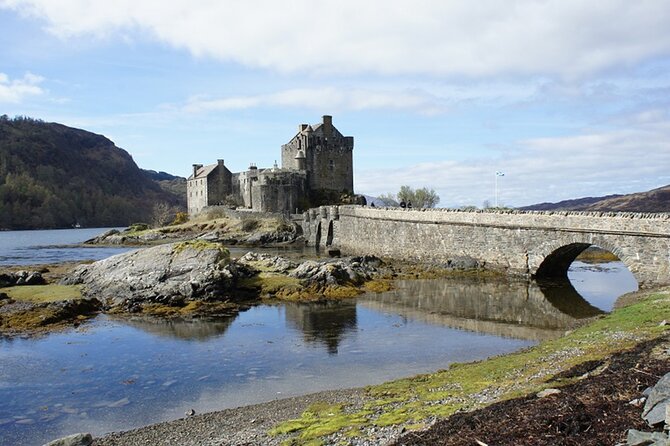 Executive Travel & Guided Tours through the Highlands of Scotland - Urquhart Castle above Loch Ness