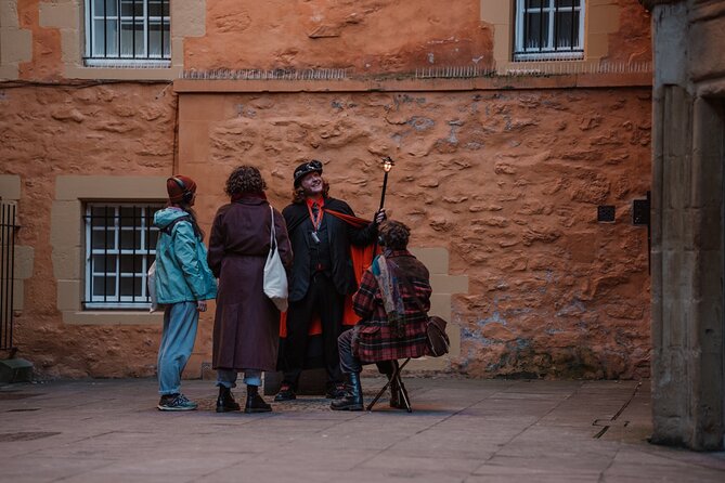 Immersive Old Town Ghost Walking Tour in Edinburgh - Mercat Cross gives the ghost walk a strong opening