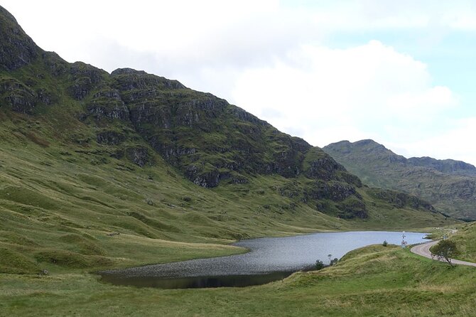West Coast Lochs & Castles Tour - from Glasgow - Kilchurn Castle and a possible Highland cow photograph